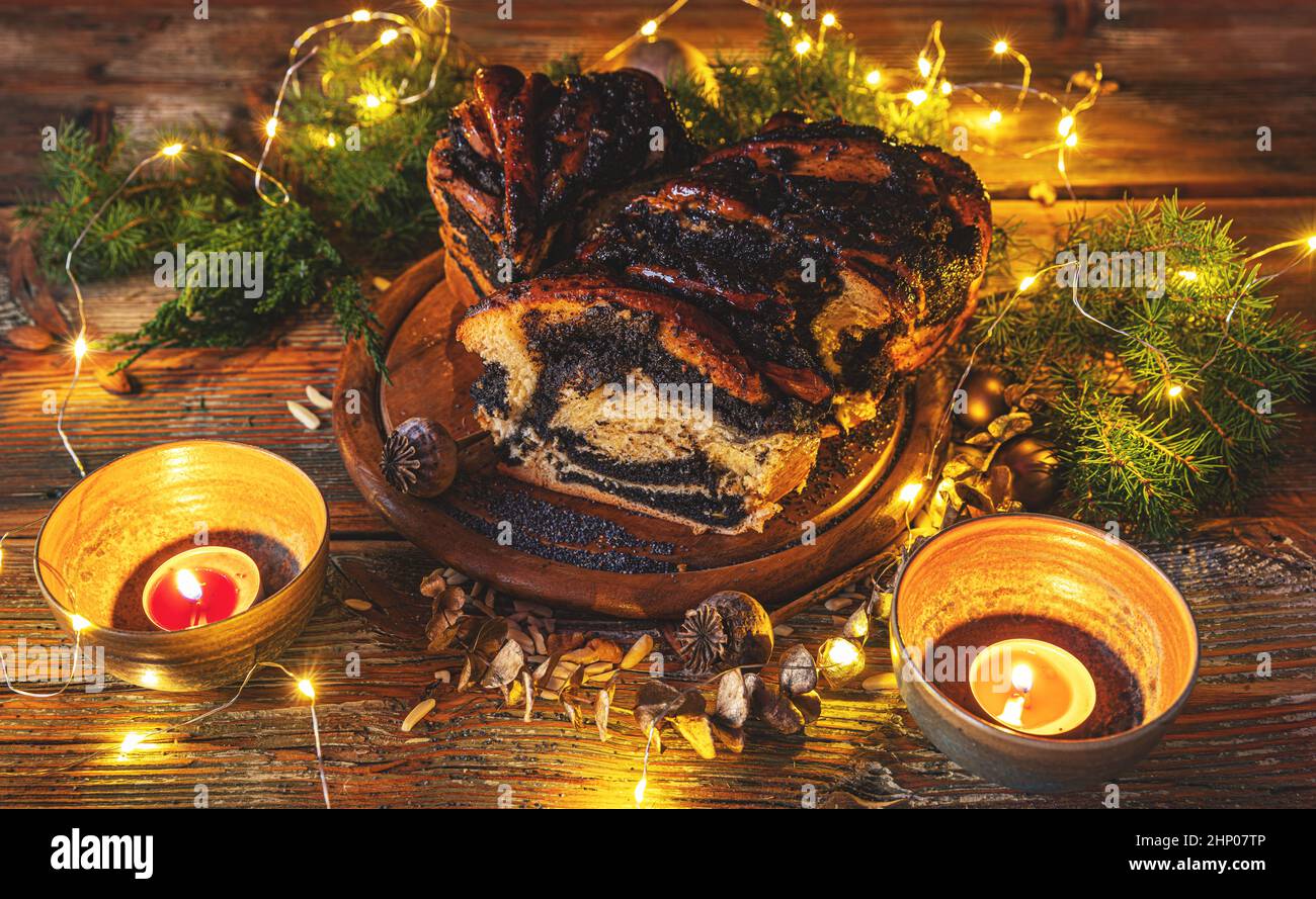 Enriched dough rolled with the traditional filling of poppy seed spread