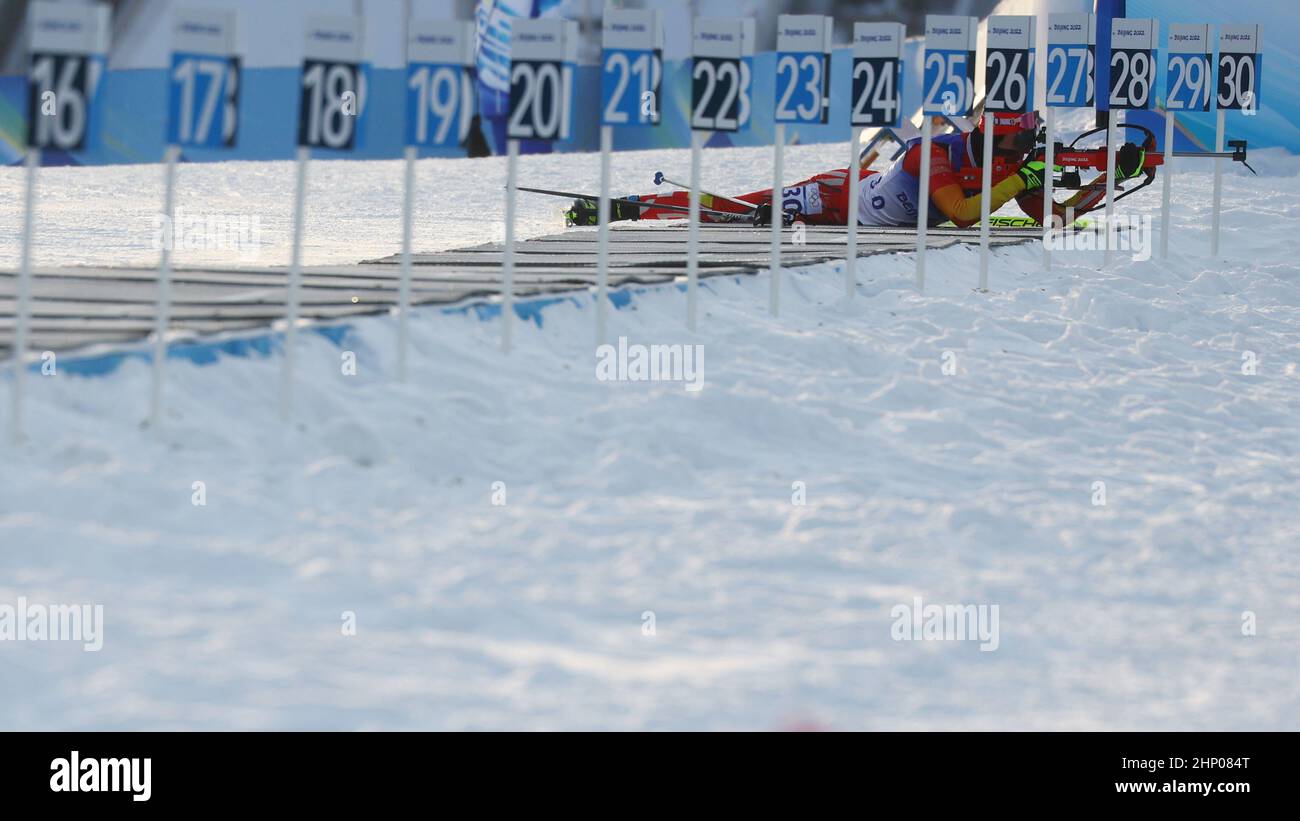 2022 Beijing Olympics - Biathlon - Men's 15km Mass Start - National Biathlon Centre, Zhangjiakou, China - February 18, 2022. Cheng Fangming of China in action. REUTERS/Kai Pfaffenbach Stock Photo
