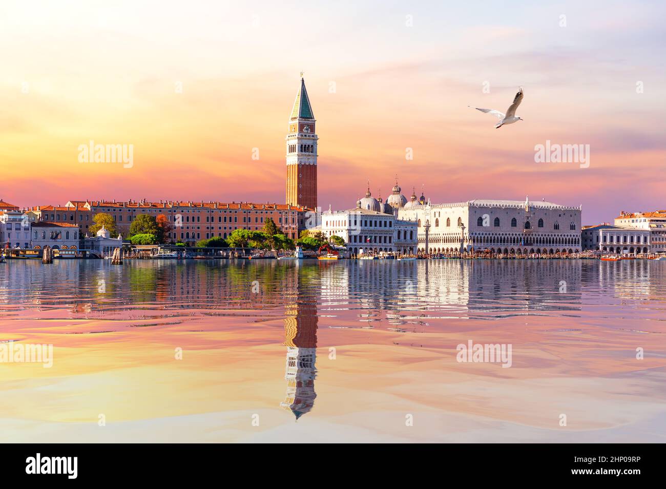 View of the Venice lagoon, St Mark's Bell Tower and Doge's palace at sunset, Italy. Stock Photo