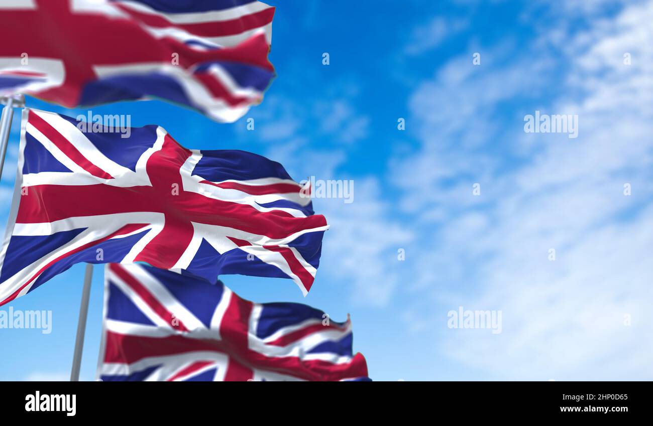 Uk Three Flags Three national flag of the United Kingdom flying in the wind. Outdoors ...