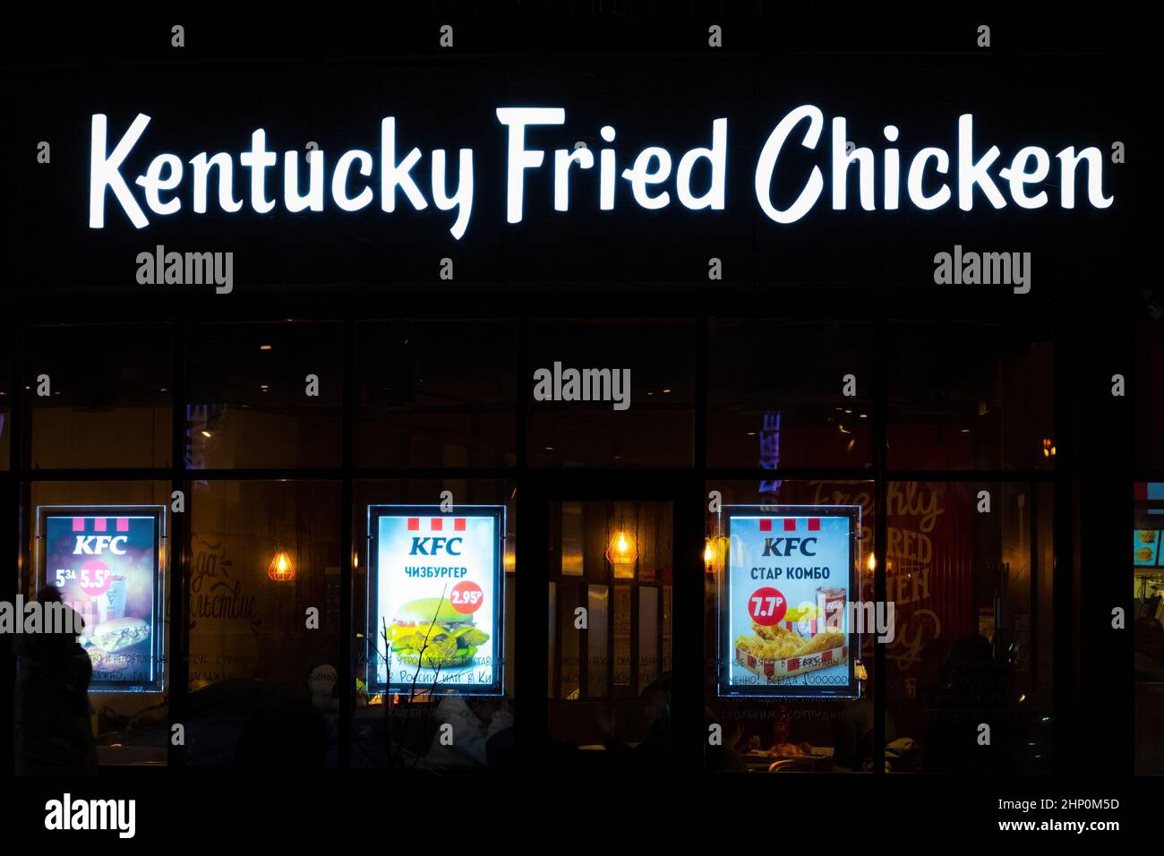 KFC (Kentucky Fried Chicken) showcase and neon logo (signboard) Stock Photo