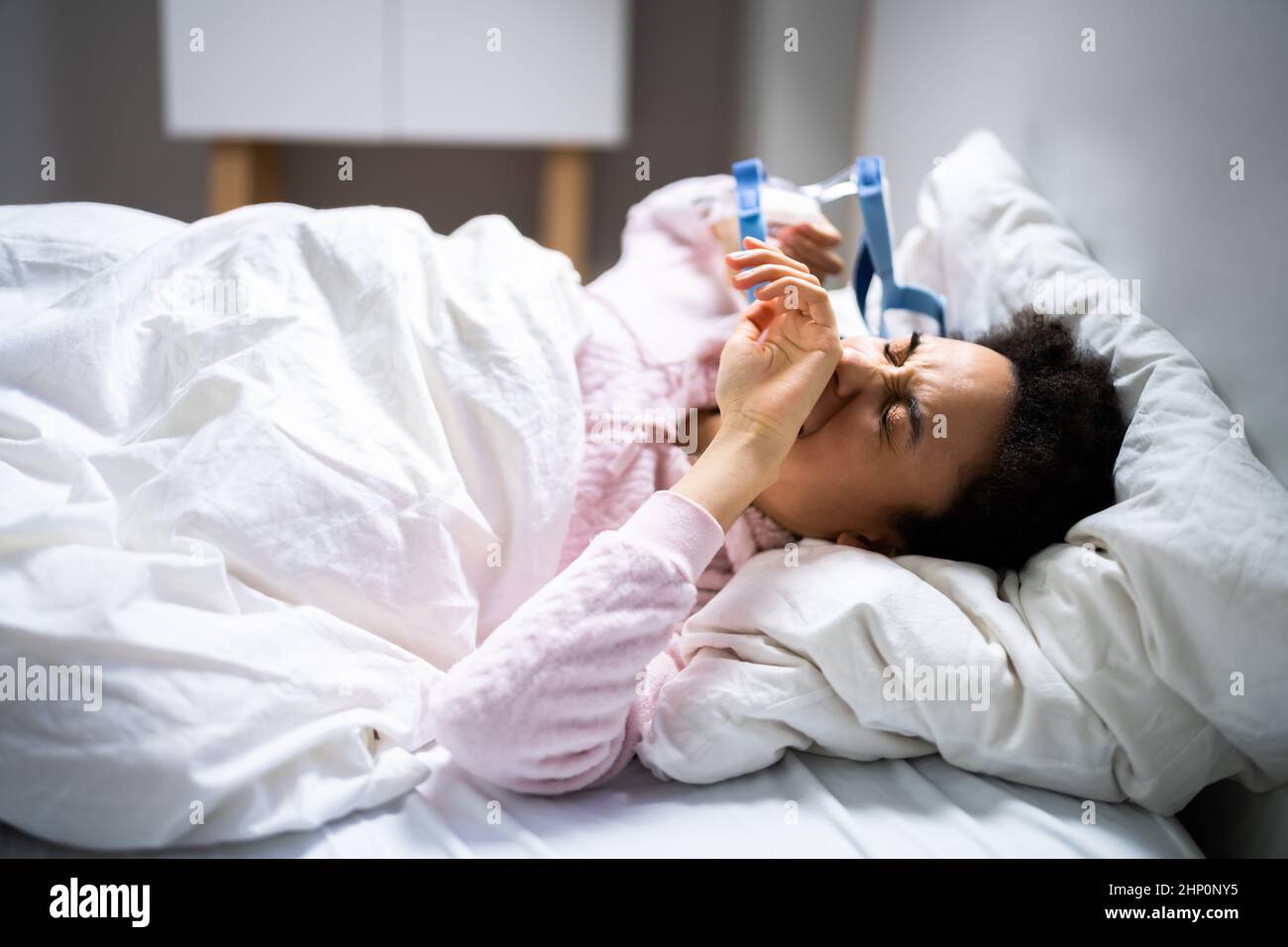 CPAP Machine Breath Mask For Sleep Apnea At Bed Stock Photo Alamy
