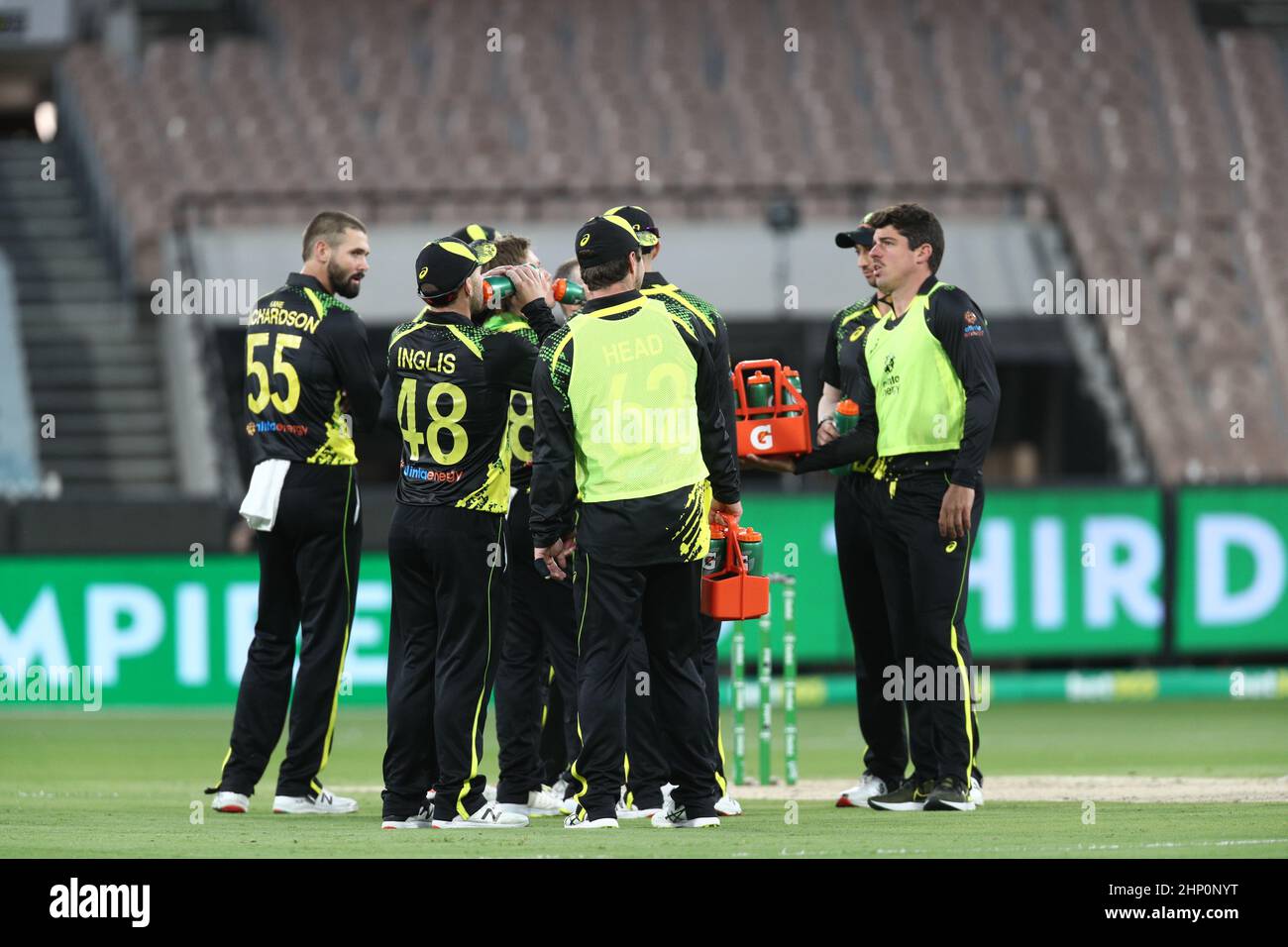 MELBOURNE, AUSTRALIA - FEBRUARY 18: Players from the Australian team  celebrate the wicket during game four of the T20 International Series  between Australia and Sri Lanka at the Melbourne Cricket Ground on