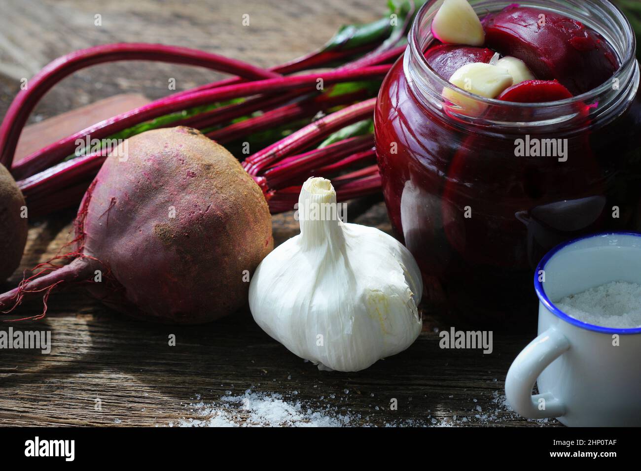 Pickled beets in the jar on a dark wood background Stock Photo Alamy