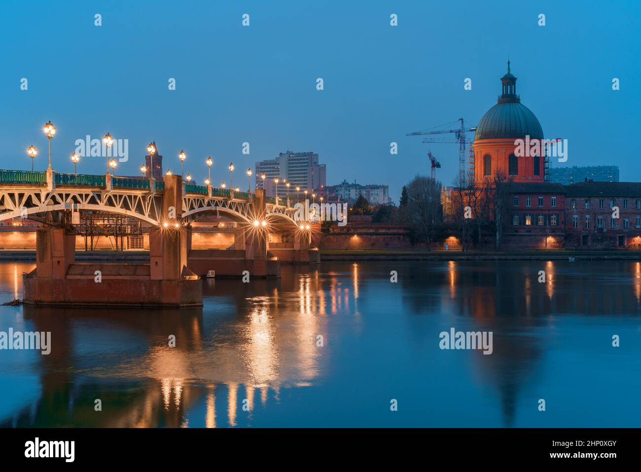 Garonne river and Dome of the 'Hopital de la Grave' at dusk in Toulouse