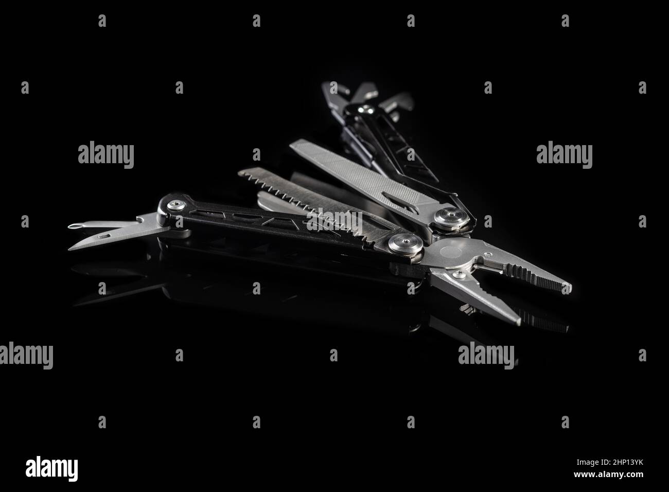 Multitools pliers with other tools and knife. Multifunction pliers