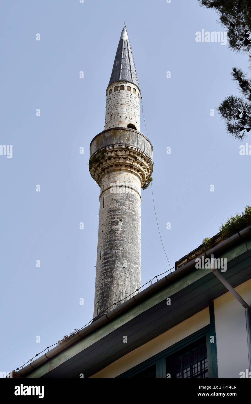 Greece, minaret of the Aslan Pasha mosque in the city of Ioannina, the capital city of Epirus Stock Photo
