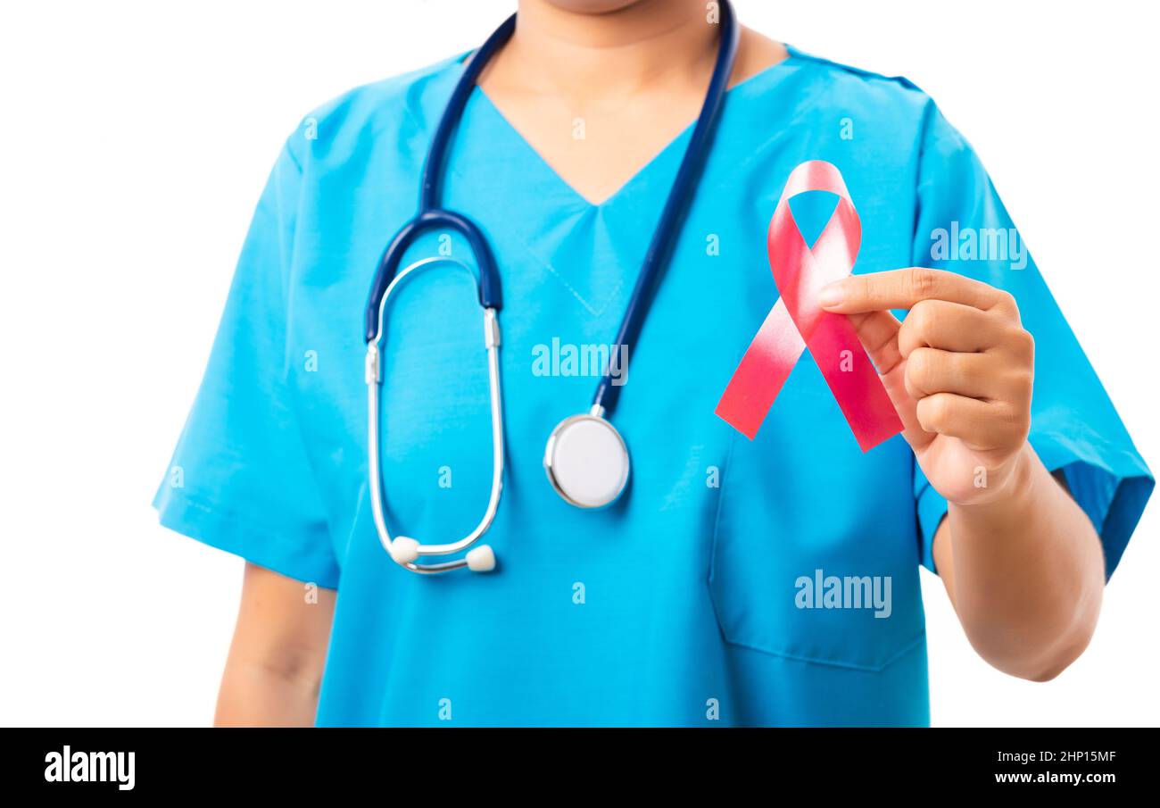 Woman nurse in clinic uniform holding support HIV AIDS awareness red ...