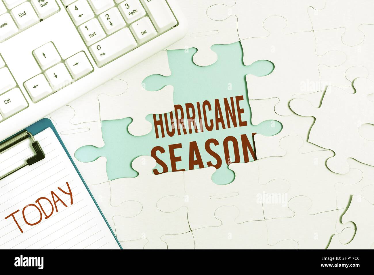 Sign displaying Hurricane Season, Internet Concept time when most tropical cyclones are expected to develop Building An Unfinished White Jigsaw Patter Stock Photo