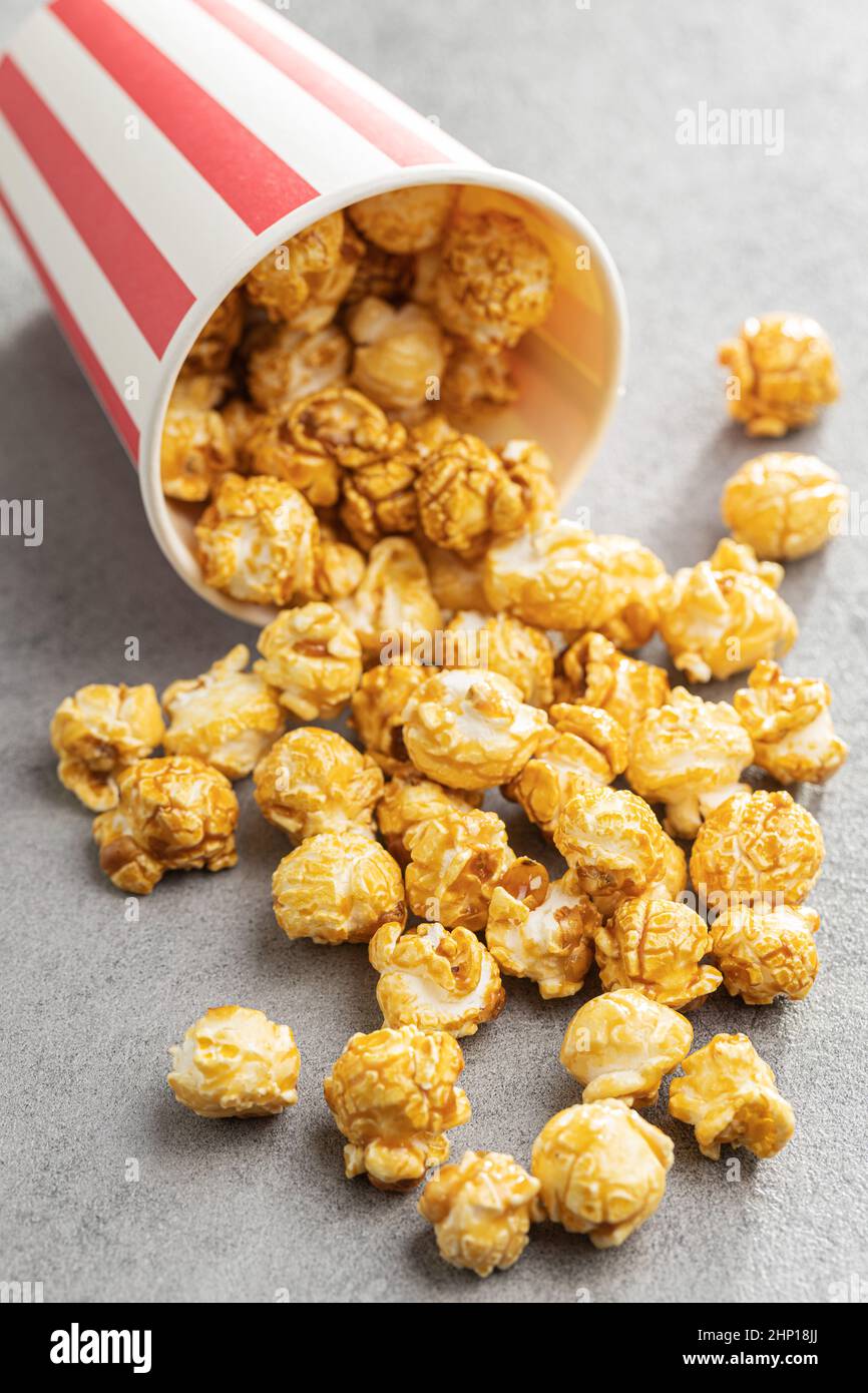 Sweet caramel popcorn in cup. Stock Photo