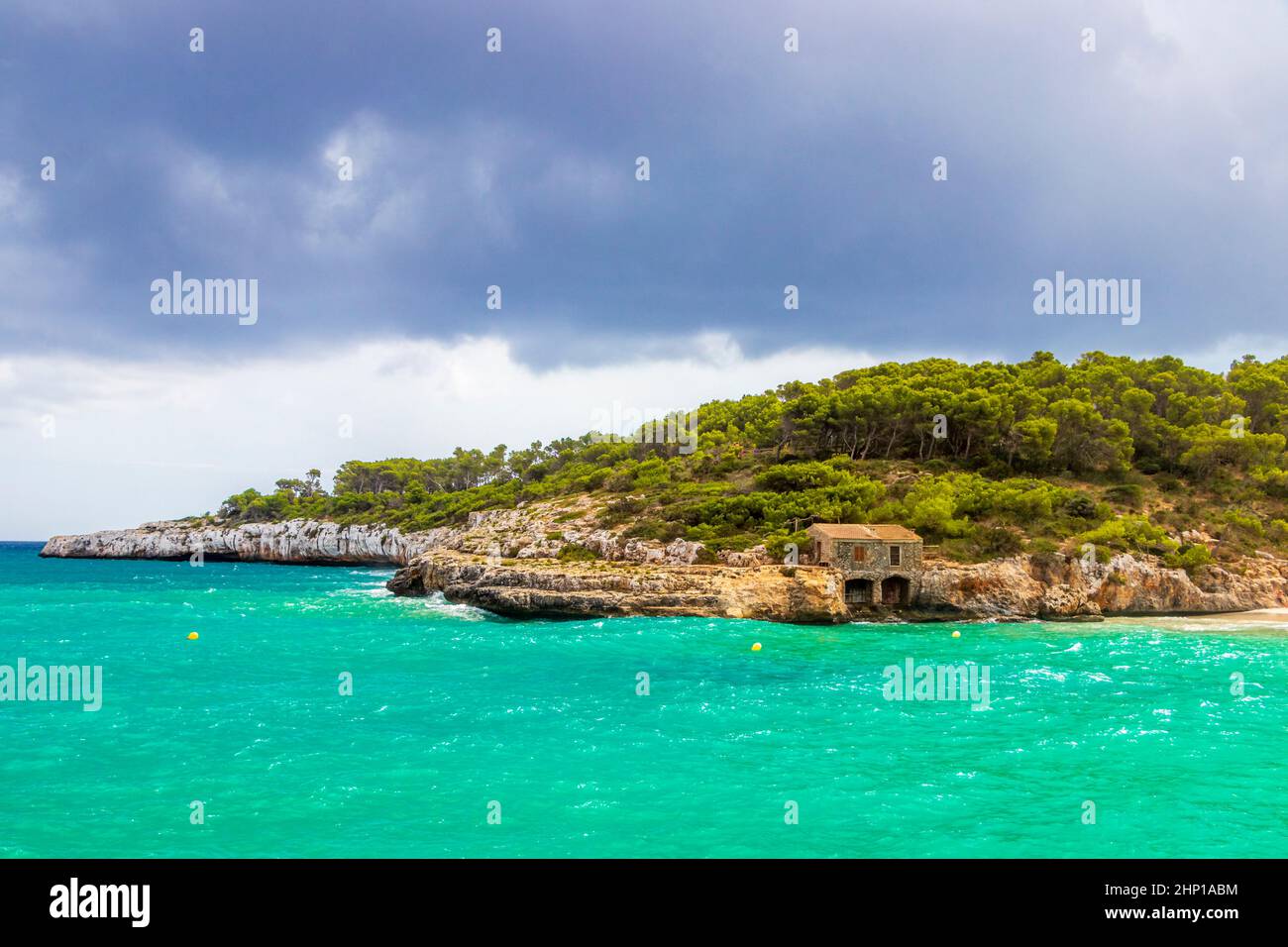 Turquoise Beach And Bay Of Cala Samarador Amarador In Mallorca Balearic turquoise-beach-and-bay-of-cala-samarador-amarador-in-mallorca-balearic