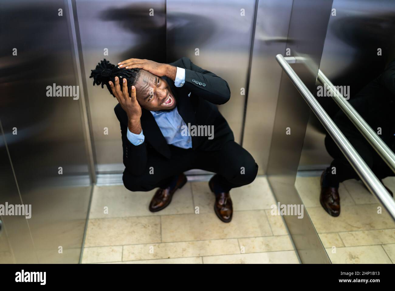 Trapped Or Stuck Inside Elevator. Fear And Agoraphobia Stock Photo