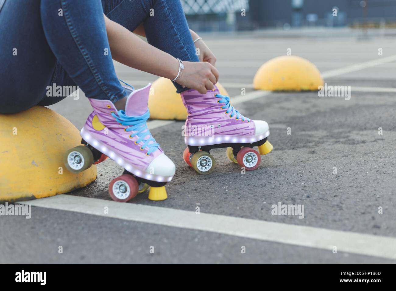 Close-up of woman legs wearing roller skating shoe. Active lifestyle, outdoor Stock Photo