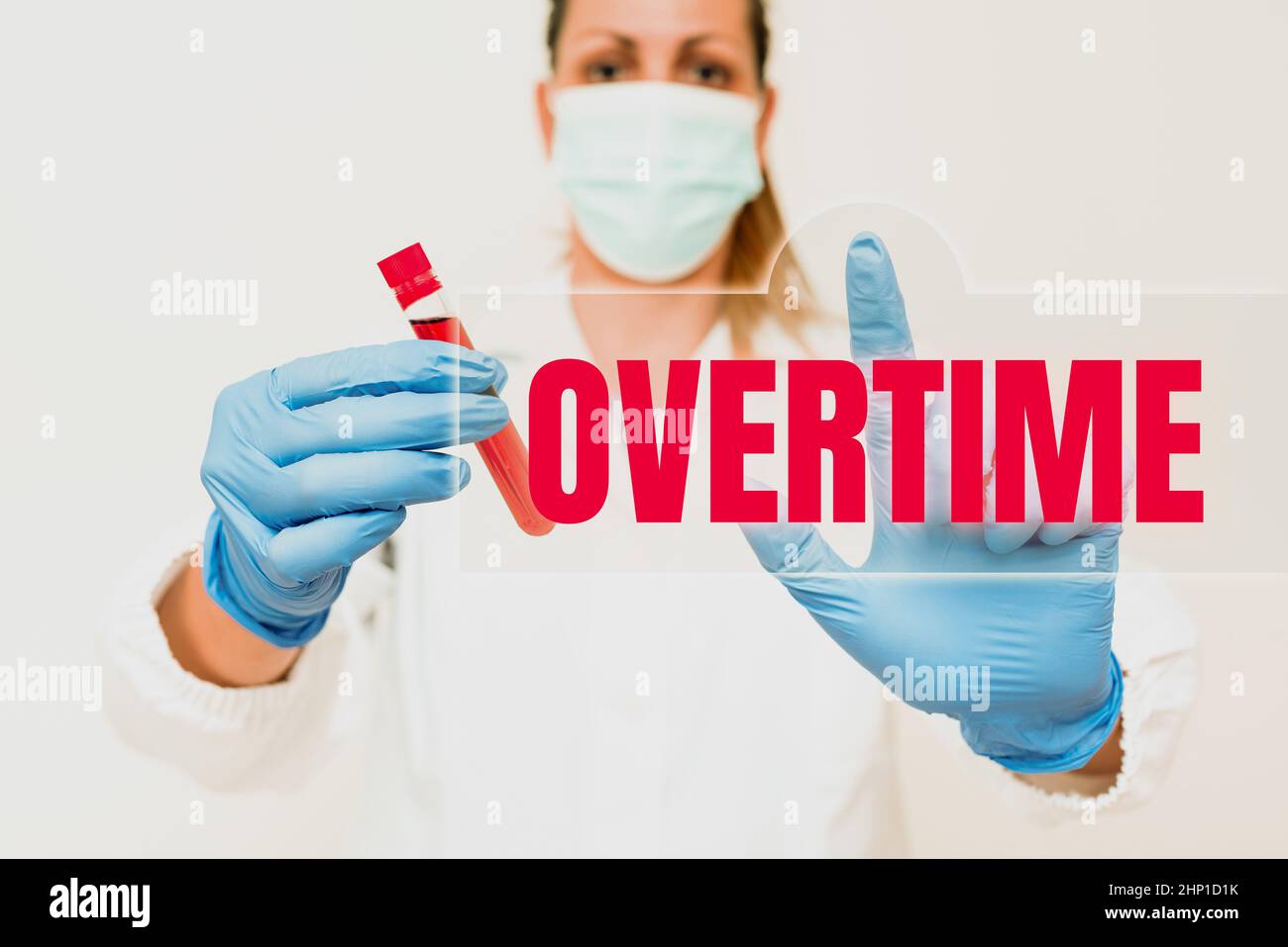 Text caption presenting Overtime, Business idea Time or hours worked in addition to regular working hours Studying Toxic Virus Analyzing Viral Discove Stock Photo
