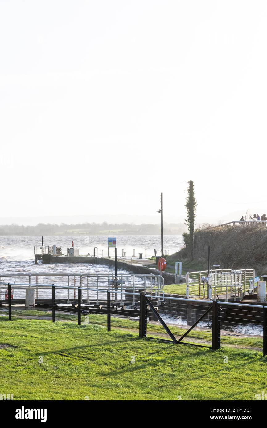 0900 Friday 18th February 2022. Storm Eunice: Lydney Harbour, Forest of Dean, River Severn, Gloucestershire. High tide and storm surge threaten to ove Stock Photo