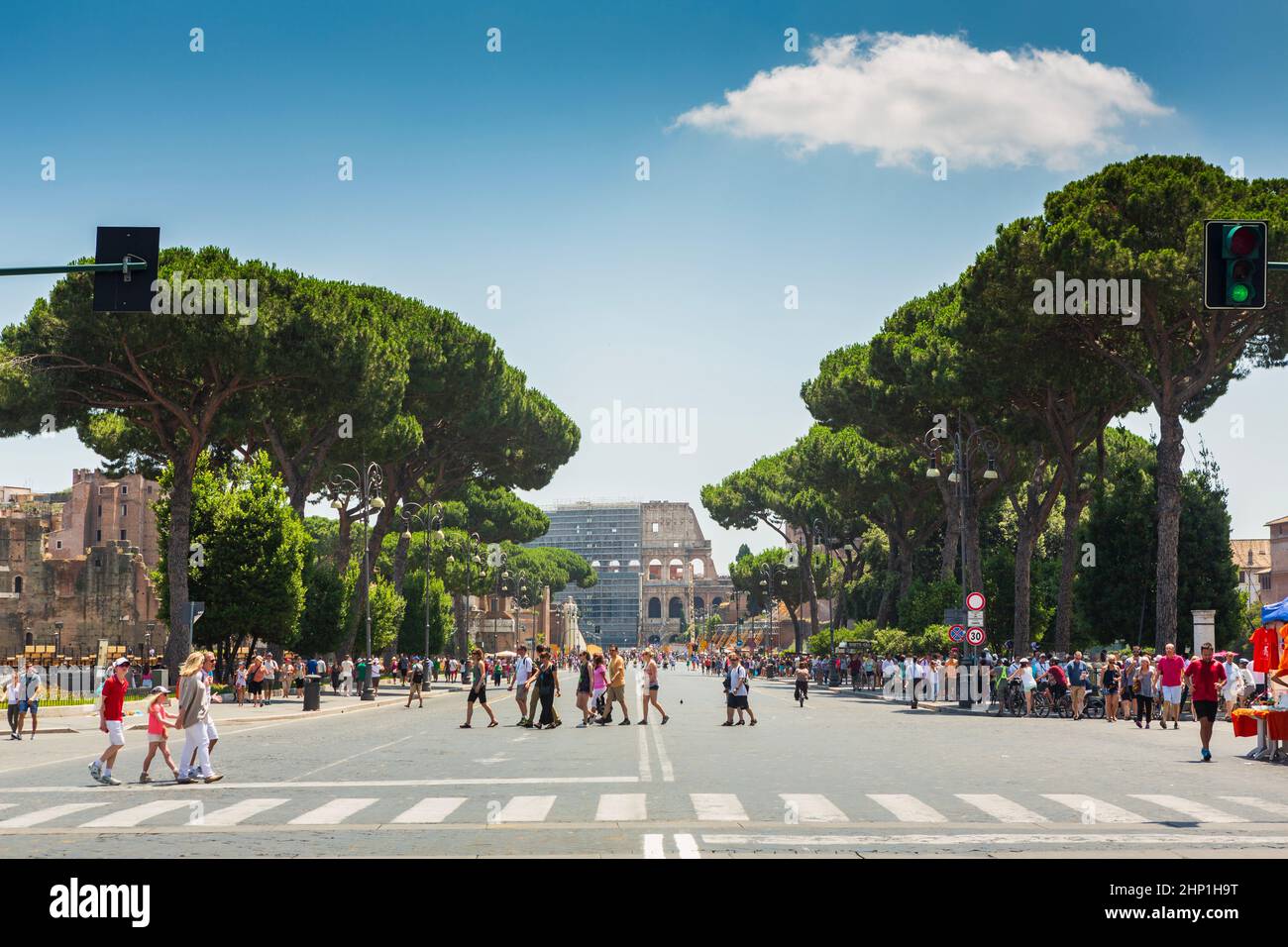 Imperial Way Rome Rome, Italy, June 28, 2014: Tourists walk the Via dei Fori Imperial ...