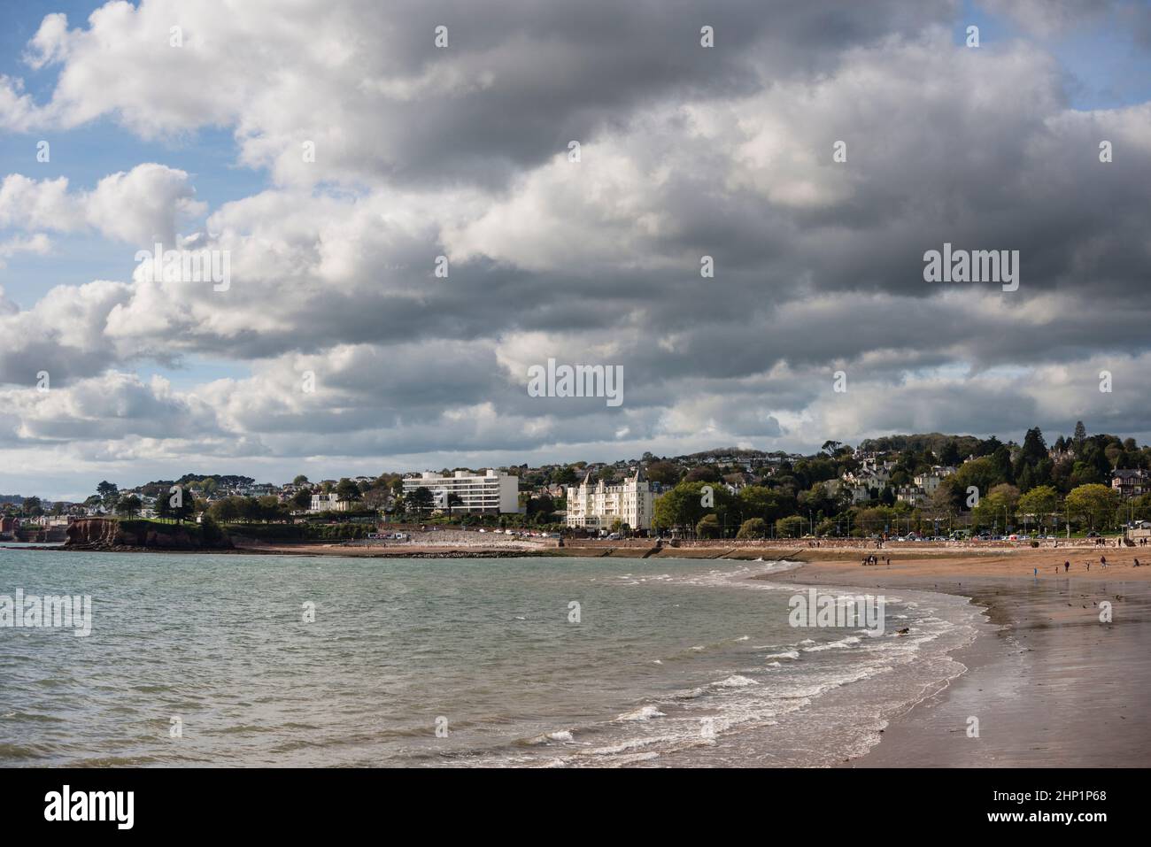 View of people on beach, nice weather, Torquay Seafront, Devon, UK Stock Photo