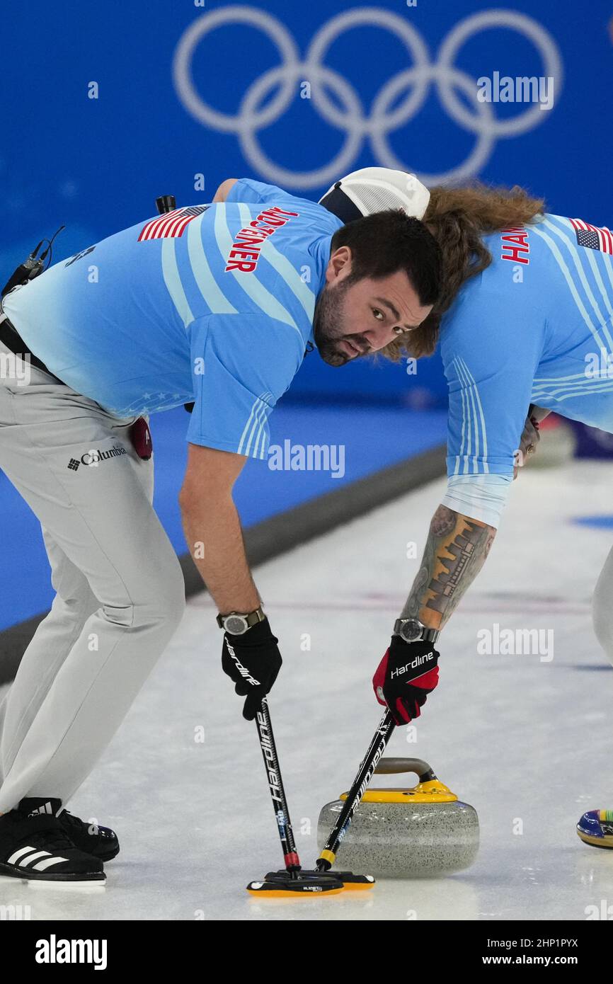 Beijing, China. 18th Feb, 2022. Team USA John Landsteiner (L) and Matt Hamilton sweep during their Men's Curling Bronze Medal Game against Team Canada at the Beijing 2022 Winter Olympics on Friday, February 18, 2022. Photo by Paul Hanna/UPI Credit: UPI/Alamy Live News Stock Photo