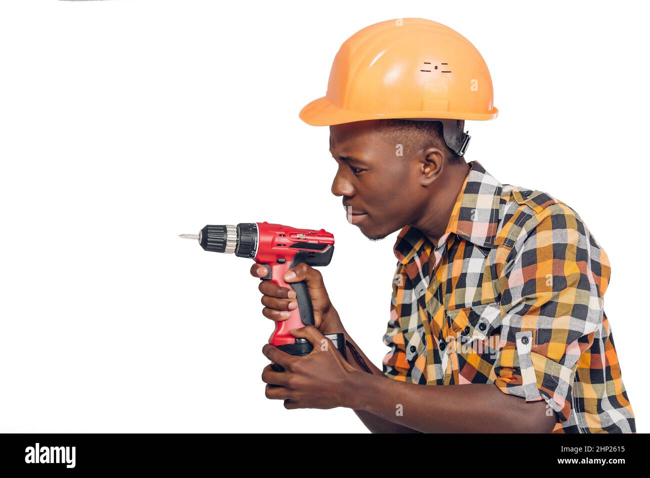 African American construction worker in helmet uses electric