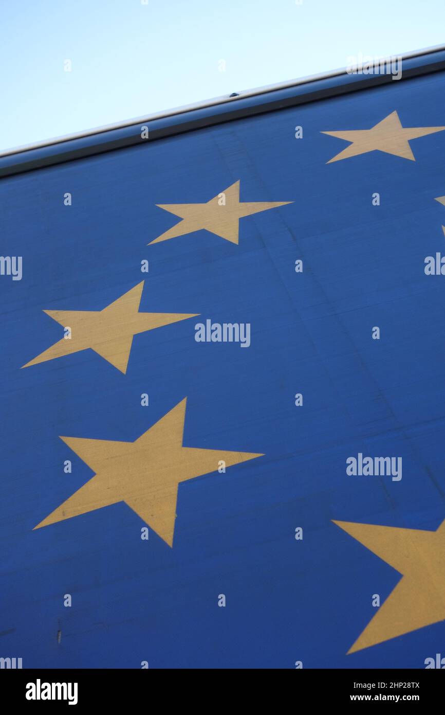 European Union flag, blue flag with yellow stars representing the EU Stock Photo