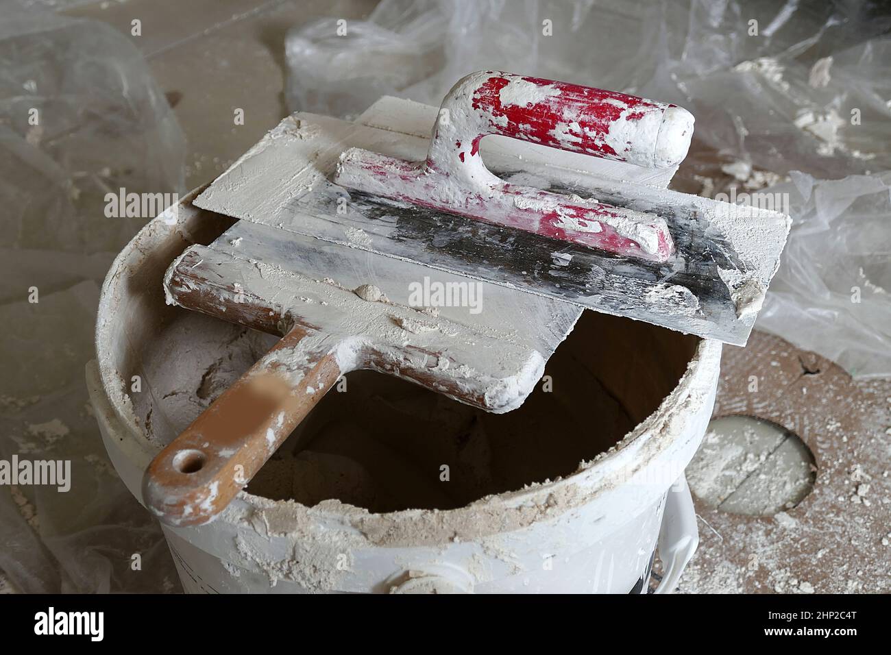 used dirty plaster materials, various materials of a plasterer for plaster, Stock Photo