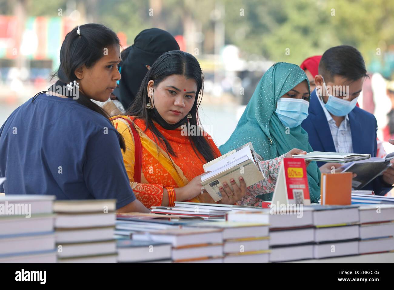 Dhaka, Bangladesh - February 18, 2022: Visitors to the book fair are