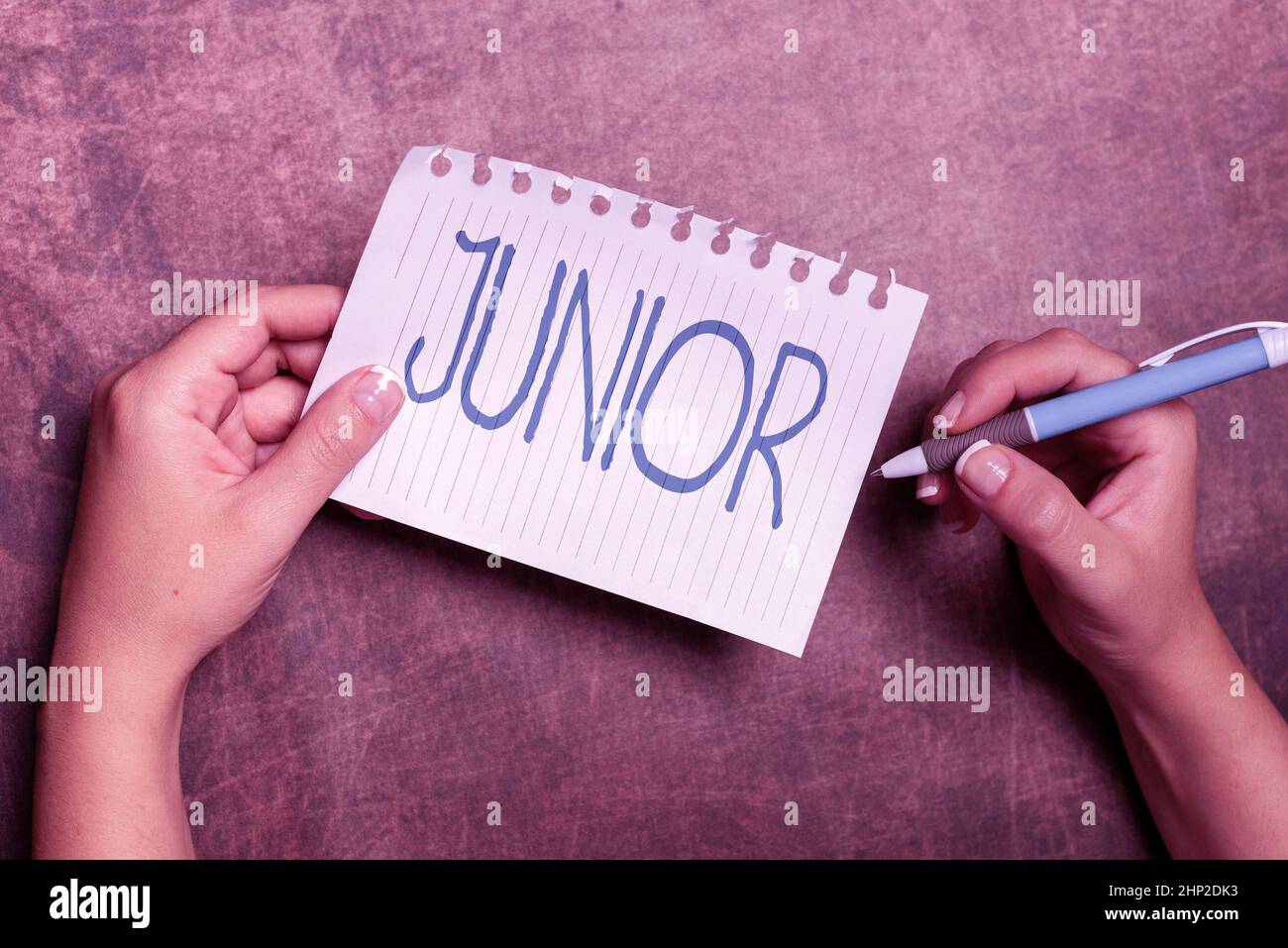 Sign displaying Junior, Business concept erson who is a specified number of years younger than someone else Writing Notes And Important Ideas Brainsto Stock Photo
