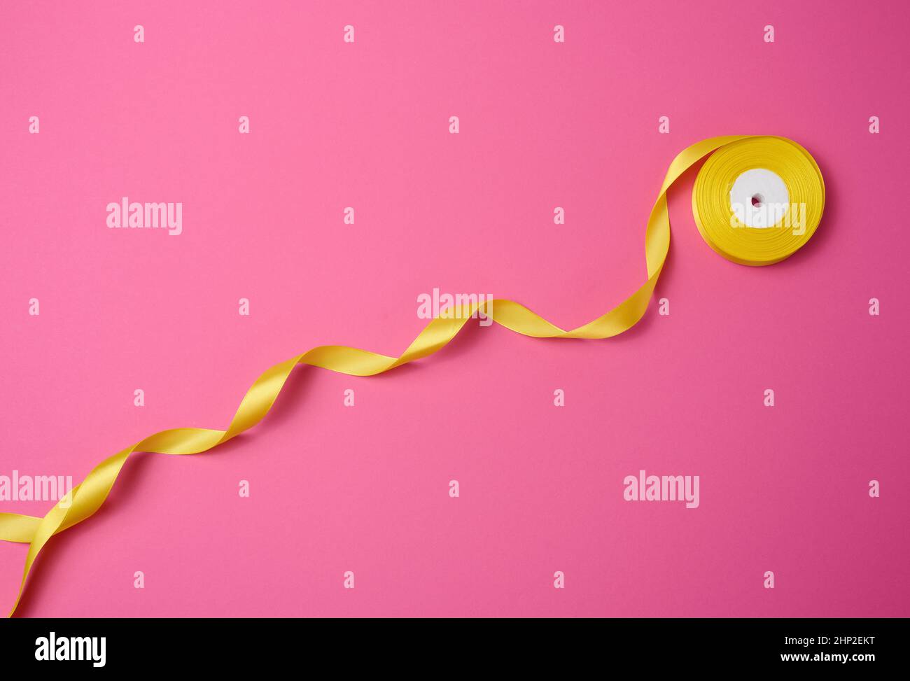 Ekt Ribbon Twisted yellow textile ribbon hi-res stock photography and images - Alamy
