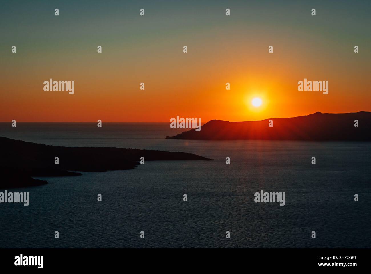 Sunset over the caldera on the island of Santorini, Greece. Stock Photo