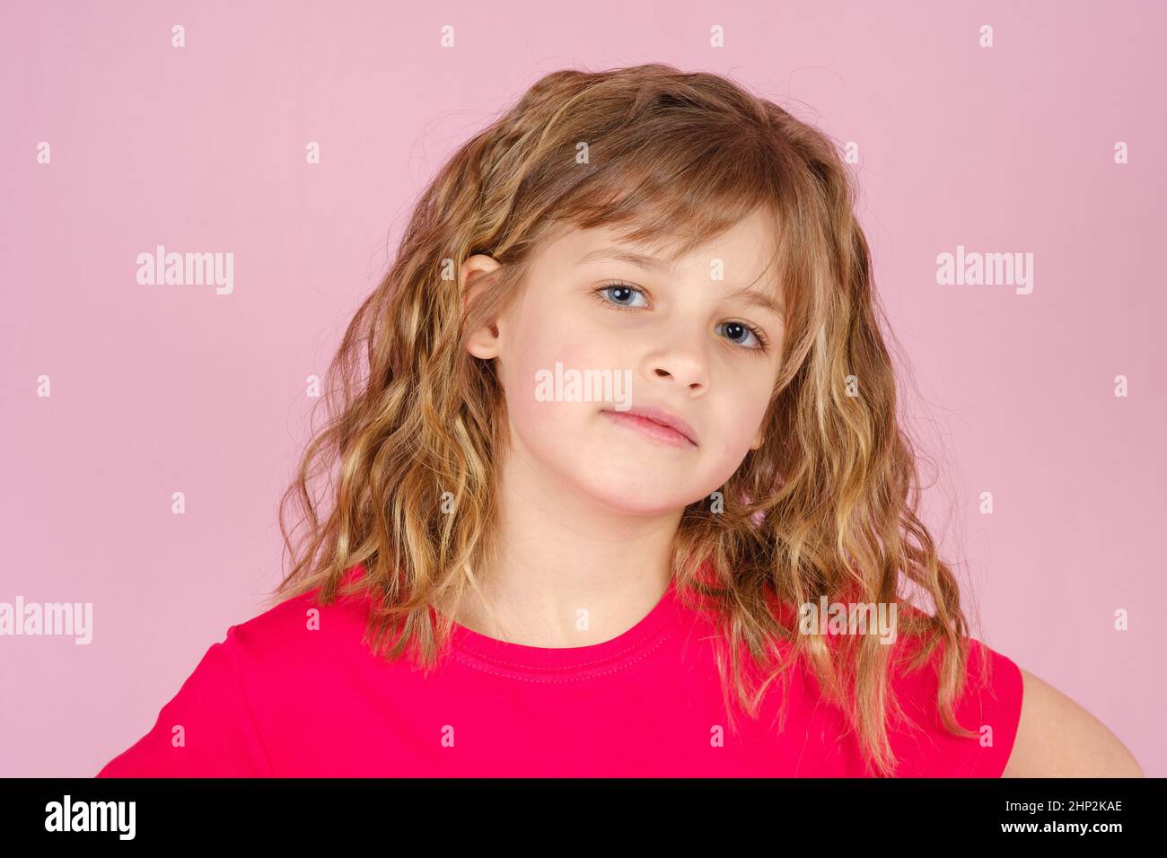 Close-up portrait of adorable little girl in studio Stock Photo