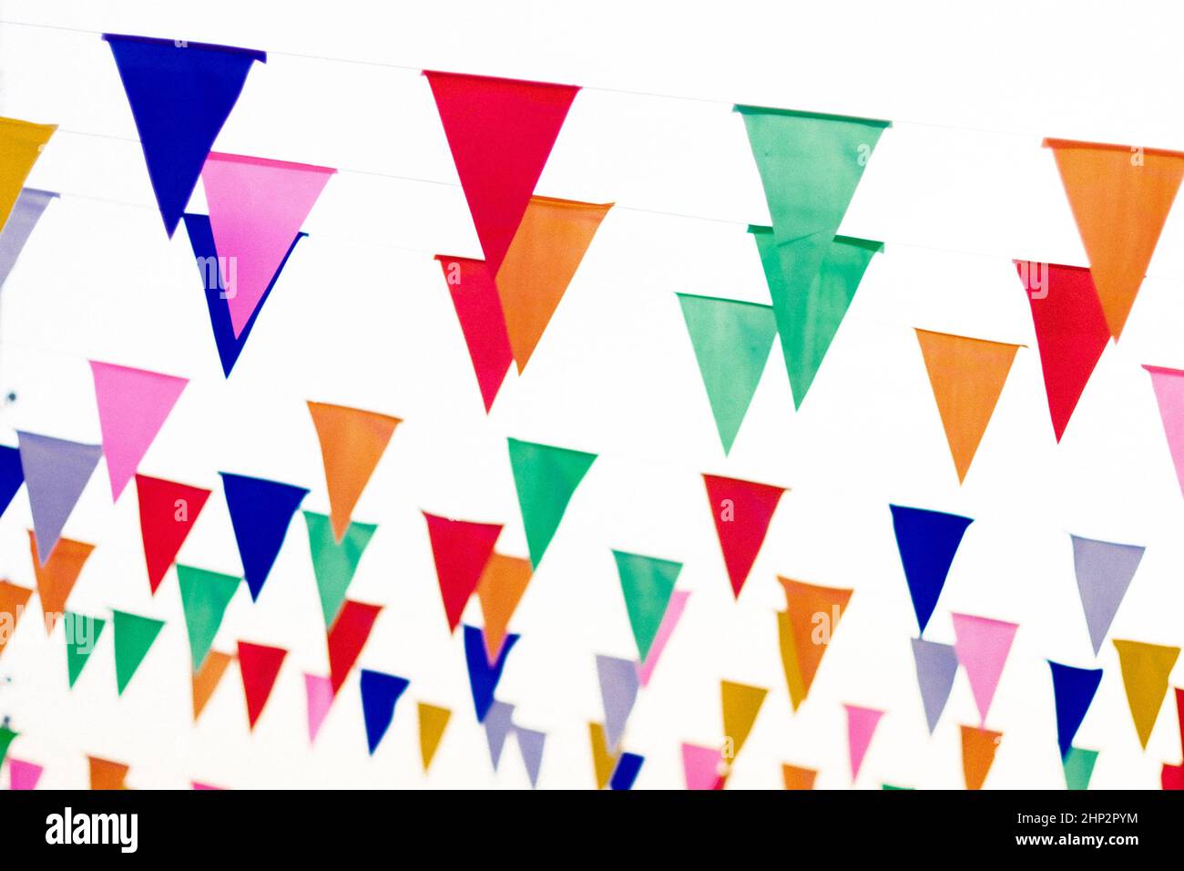 Colorful paper bunting party flags isolated on white background ...