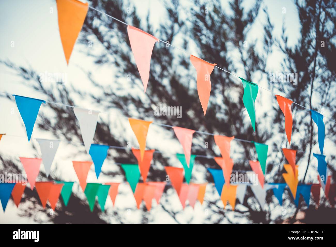 Colorful paper bunting party flags isolated on white background ...