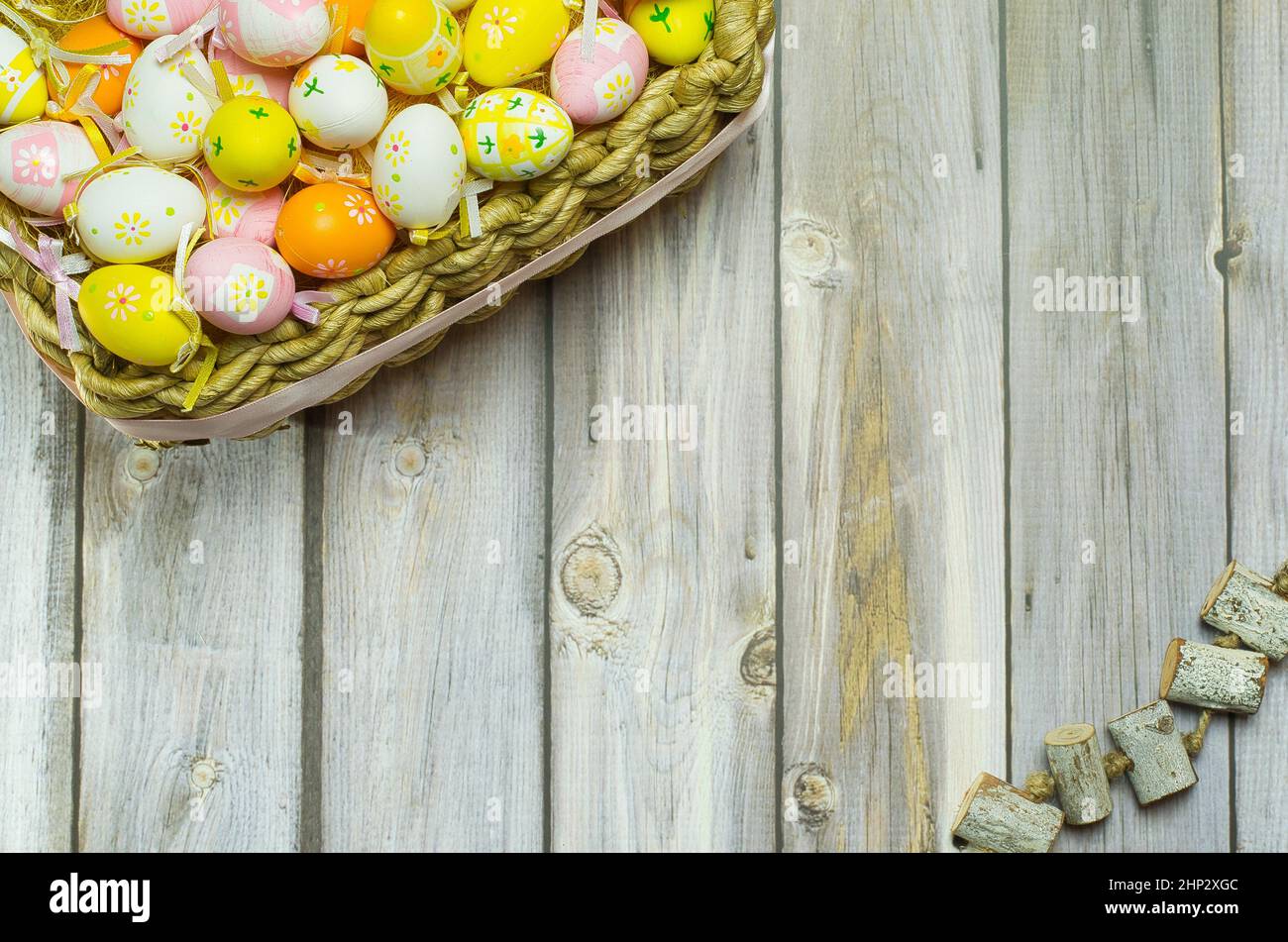 Easter egg basket colorful, hand painted. Easter background with space to write Stock Photo