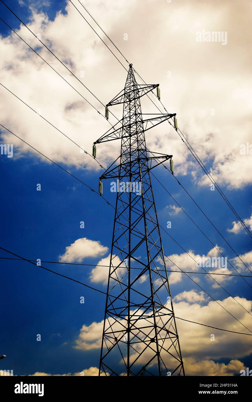 Power towers with blue sky and clouds Stock Photo - Alamy