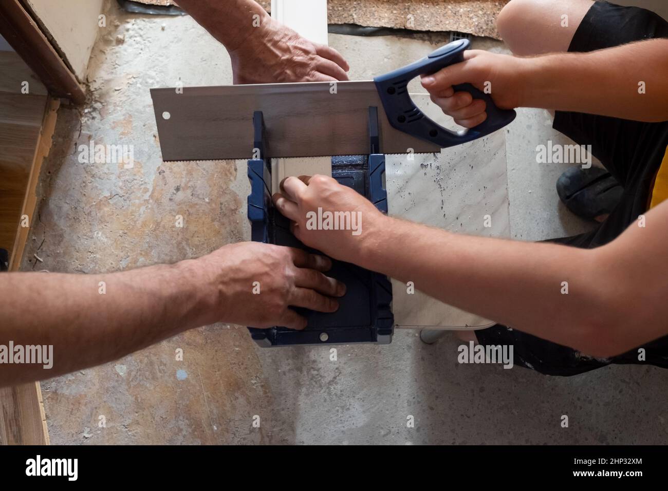 Miter box and hacksaw for sawing wooden or plastic parts Stock Photo