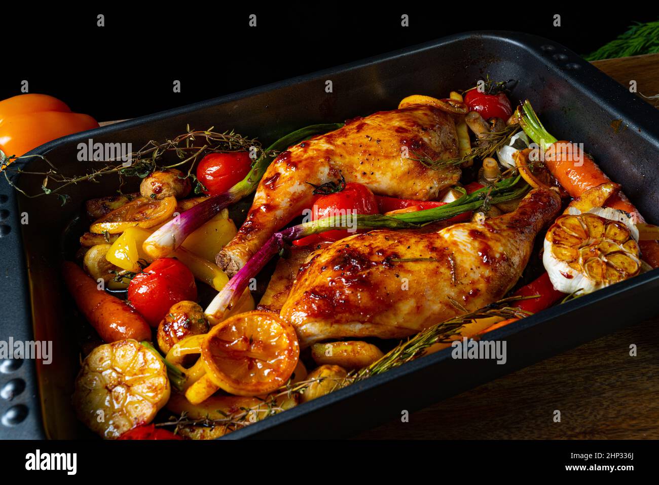 fried chicken legs with various vegetables Stock Photo