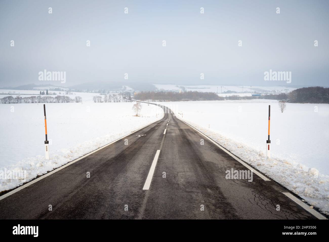 Country road in snowy winter day Stock Photo - Alamy