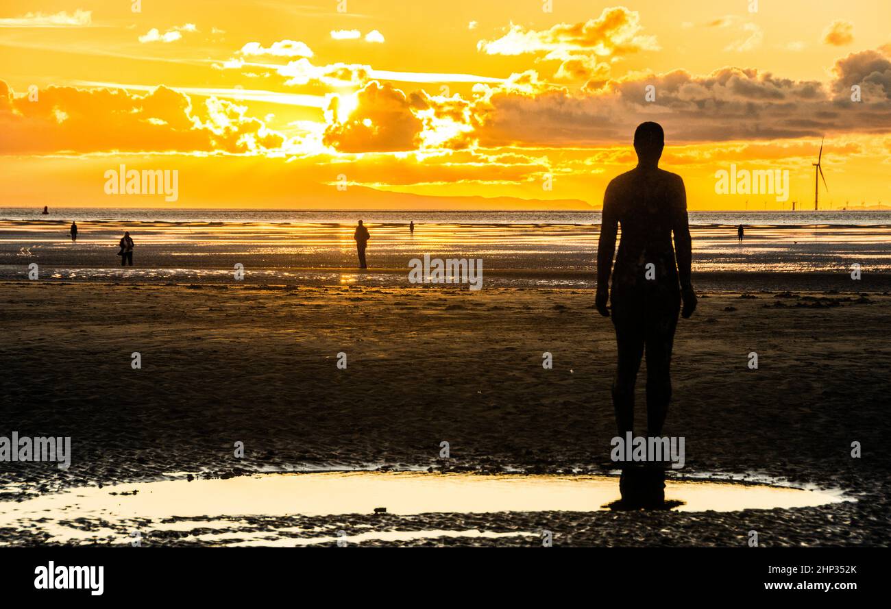 Statues on Crosby Beach created by Anthony Gormley Stock Photo Alamy