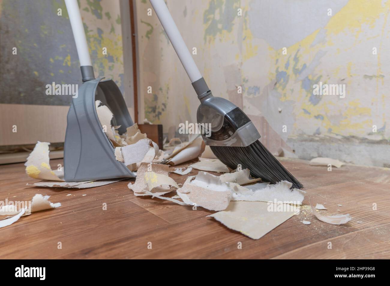 Clean up garbage after repairs.Sweep up construction debris with a