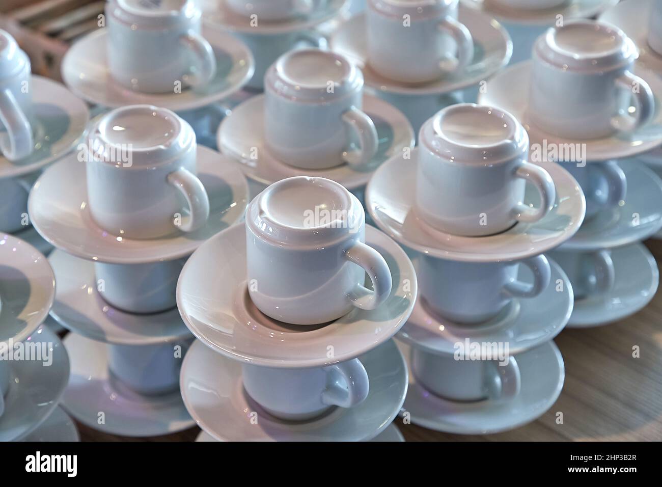 Clean coffee cups stack in a cafe, no guests Stock Photo Alamy