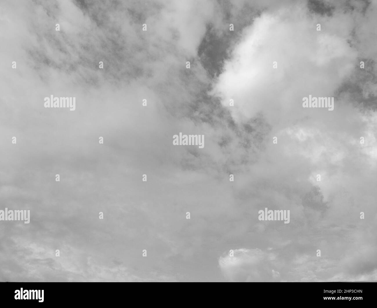 sky with clouds useful as a background in black and white Stock Photo ...