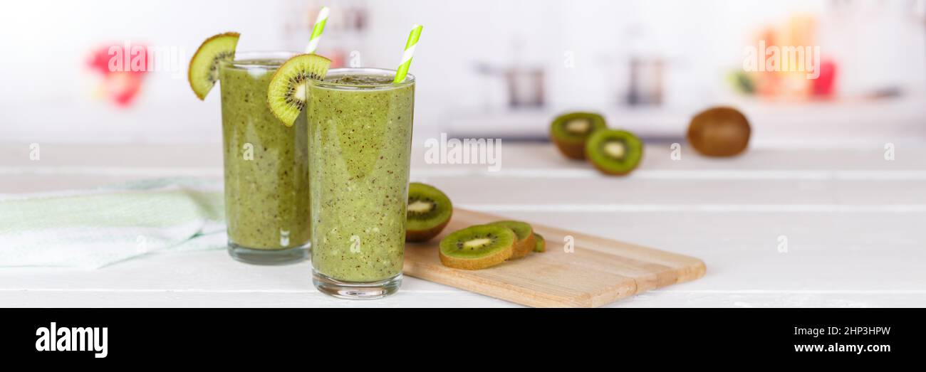 Green smoothie fruit juice kiwi drink in a glass panorama with copyspace copy space healthy drinking Stock Photo