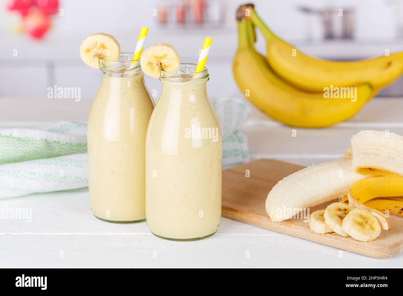 Banana fruit juice smoothie fresh drink in a bottle healthy drinking