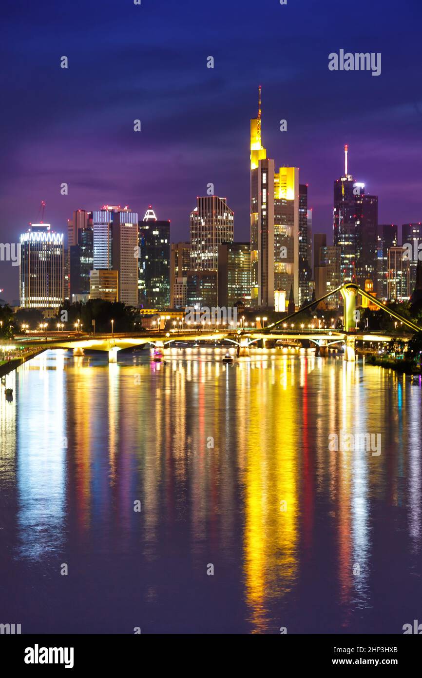 Frankfurt skyline with Main river skyscraper portrait format in Germany twilight Stock Photo