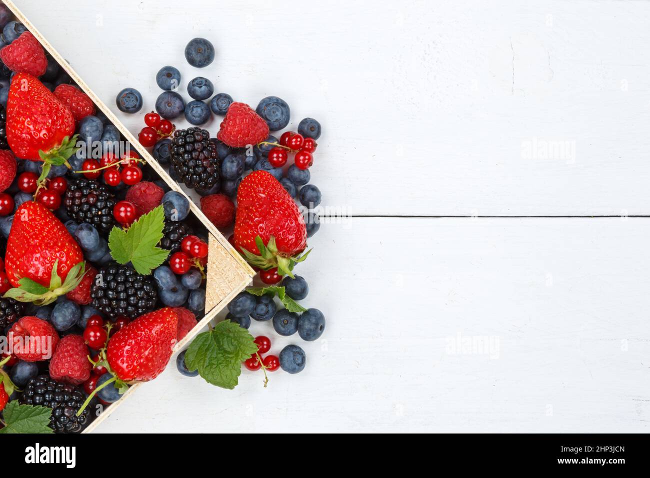 Berries fruits berry fruit strawberries strawberry blueberries blueberry with copyspace copy space from above summer Stock Photo