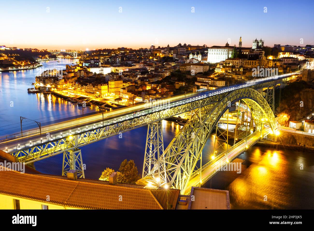 Porto Portugal with bridge Ponte Dom Luis I Douro river town travel at twilight night Stock Photo