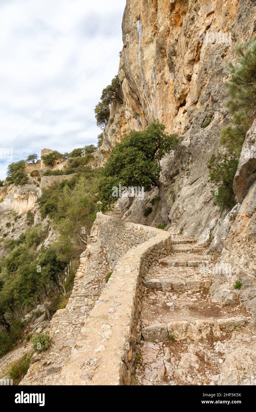 Stairs stairway to castle Castell d'Alaro hiking trail path way on Mallorca travel traveling holidays vacation portrait format tourism in Spain Stock Photo