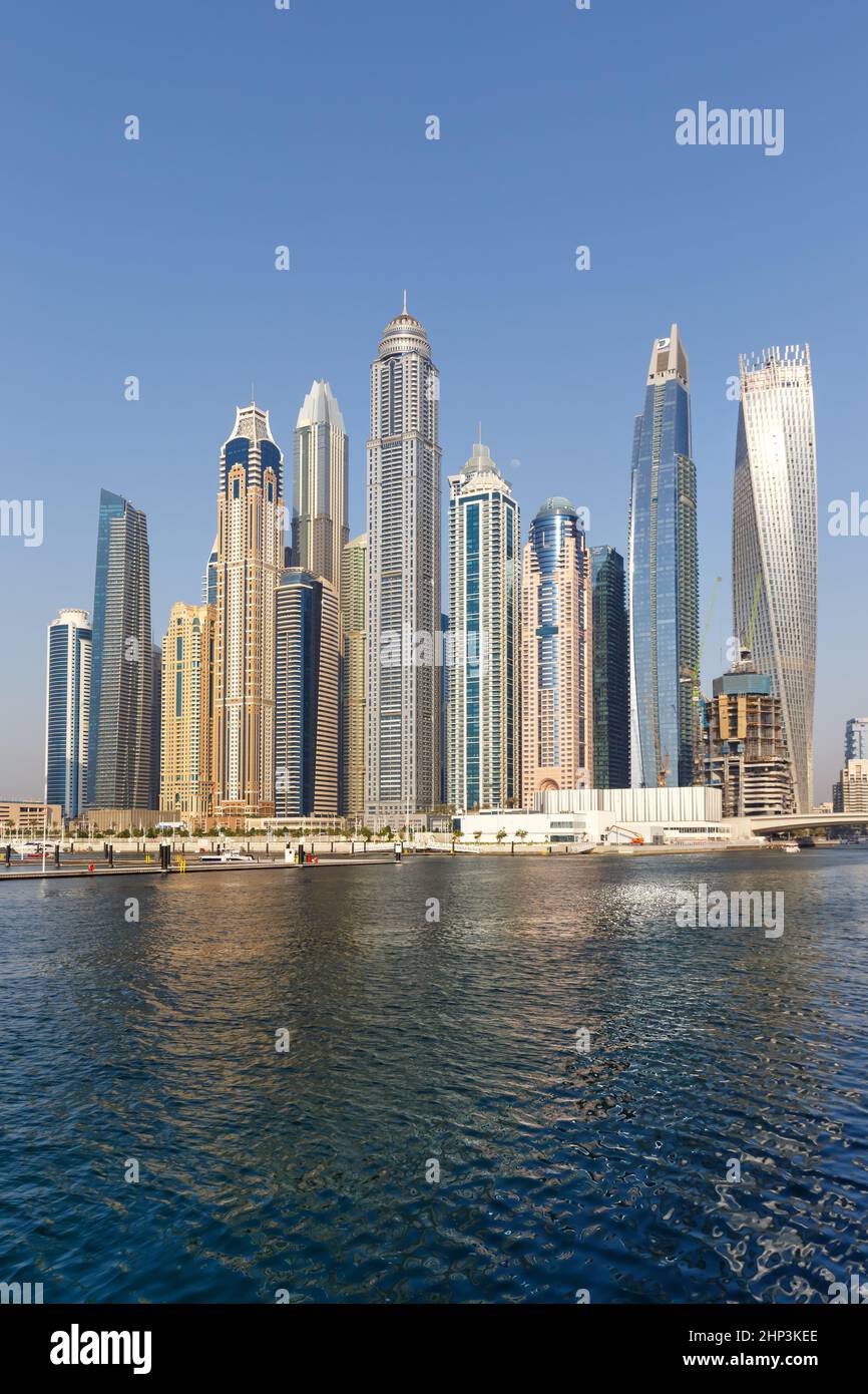 Dubai Marina and Harbour skyline architecture wealth luxury travel in United Arab Emirates portrait format modern Stock Photo