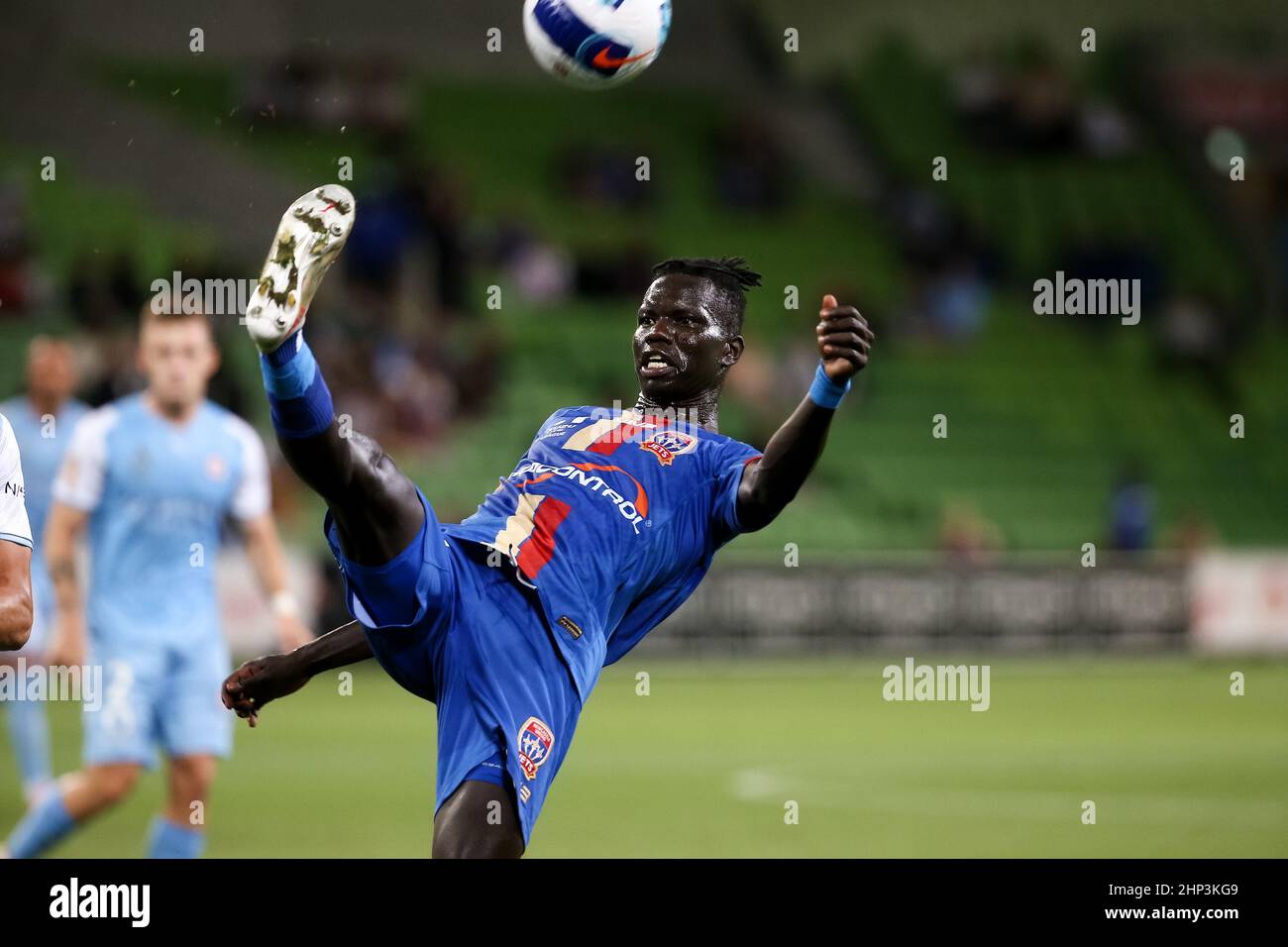 Melbourne, Australia, 18 February, 2022. Valentino Yuel of Newcastle Jets kicks the ball during the A-League soccer match between Melbourne City FC and Newcastle Jets at AAMI Park on February 18, 2022 in Melbourne, Australia. Credit: Dave Hewison/Speed Media/Alamy Live News Stock Photo