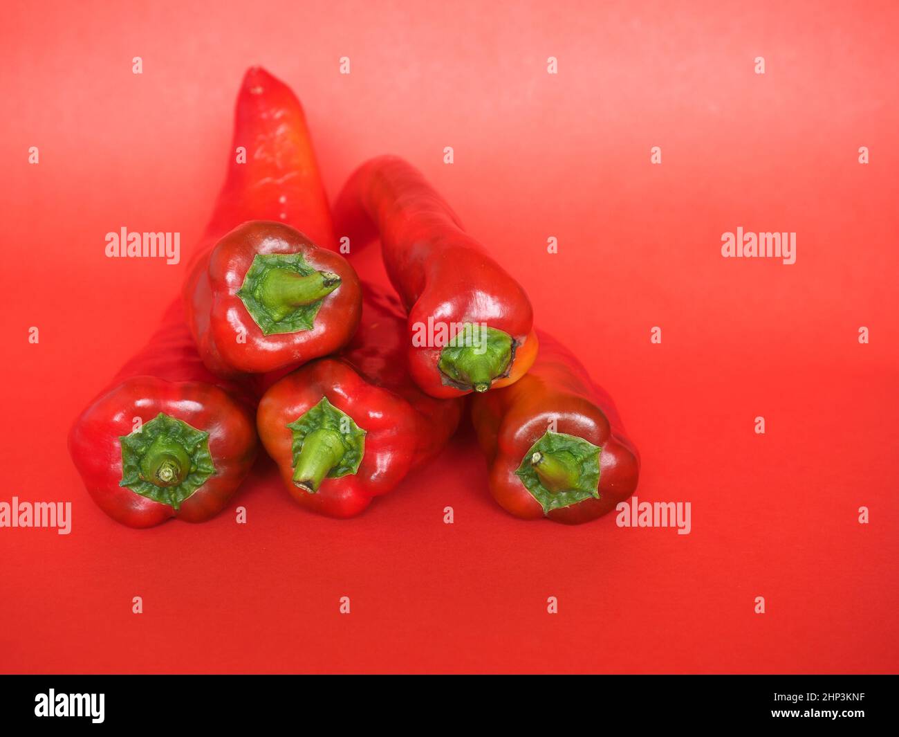 red peppers (scientific name Capsicum aka bell peppers) vegetables vegetarian food Stock Photo